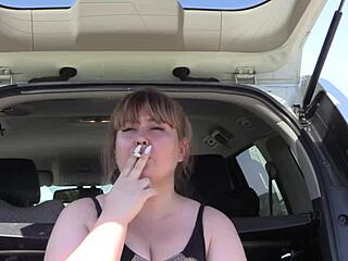 Girls smoking a cigarette on camera