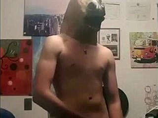 Young gay man indulges in solo play while dressed as a pony