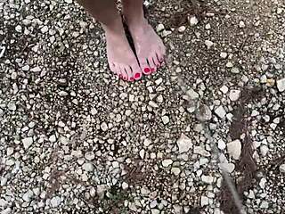 Outdoor amateur couple enjoys foot fetish on the beach